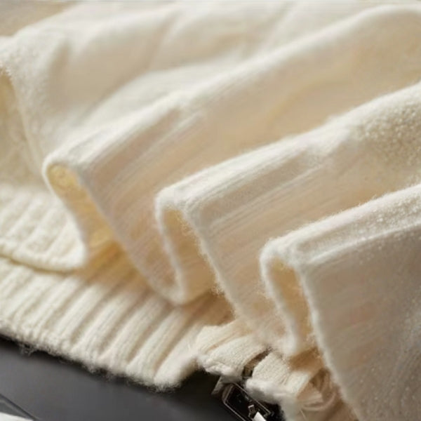 The Cortina Merino Wool Cable Zip Knit