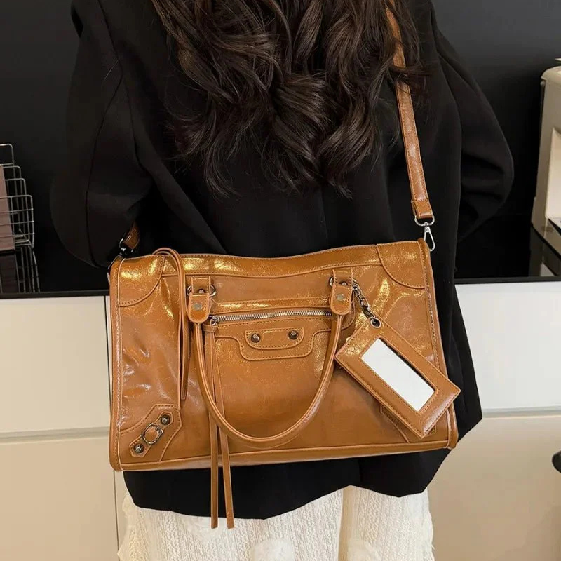 The Carmela Statement Handbag